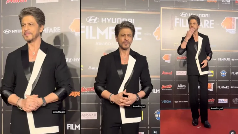 Shah Rukh Khan 70th Filmfare Awards 2025 red carpet par classic black suit me pose karte hue